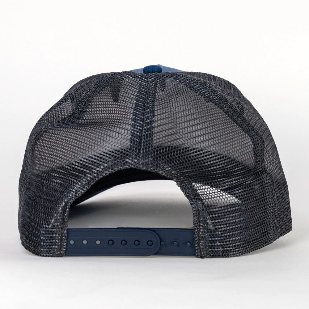A Dusk Blue / Navy trucker hat with a black mesh back, featuring a 'Watershed Watch' logo patch on the front panel.